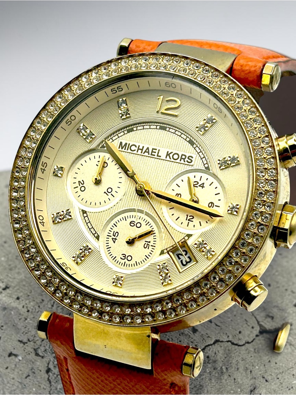 Michael Kors Parker MK2279 Chronograph Gold Tone Pave Bezel Orange Strap Runs